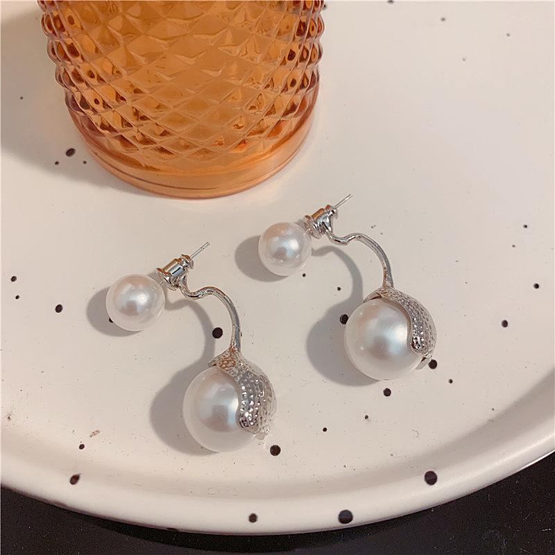 

New cold wind wearing pearl earrings before and after women s simple temperament light luxury high sense stud earrings versatile fashion earrings 925 silver needle