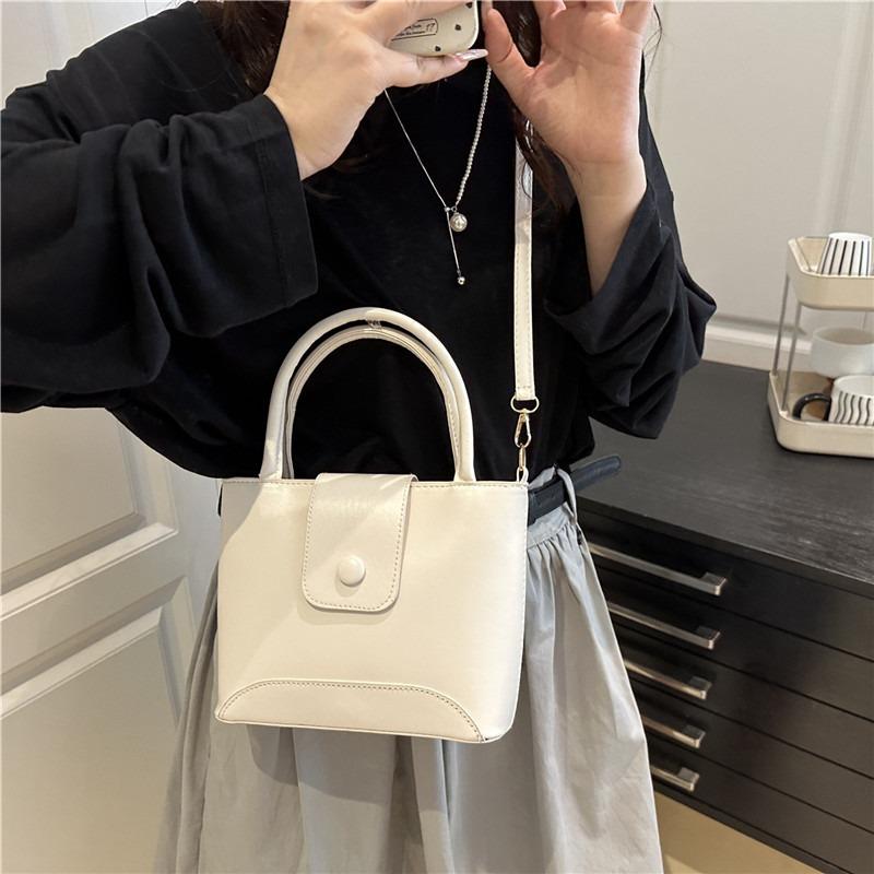 Premium simple niche fashion handbag women's summer new bucket bag single shoulder oblique span women's bag