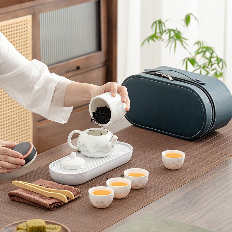 1011 New Travel Tea Set, Light Luxury and Portable, One Pot and Four Cups of Ru Kiln Car Express, Free Business Gifts