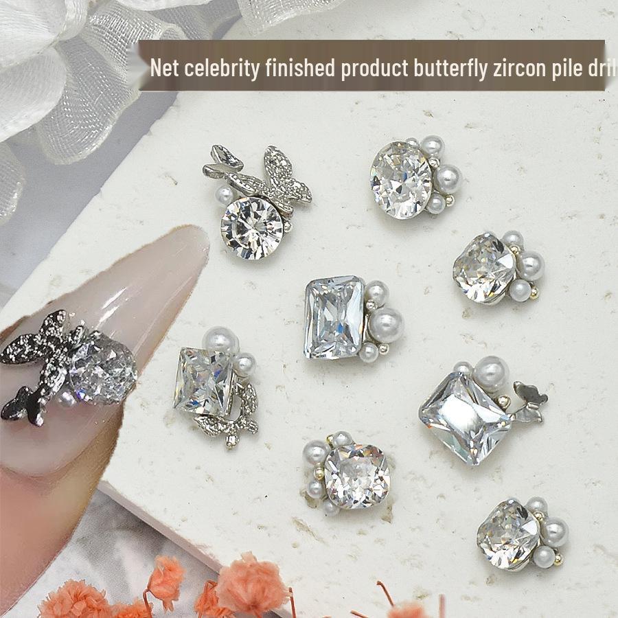 Elegant Nail Art: Pearl & Butterfly Inlaid Pigeon Egg with Zirconia and Rhinestones