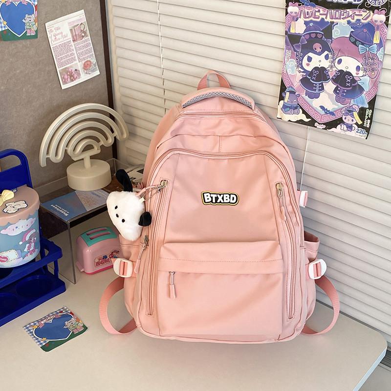Versatile Waterproof Nylon Backpack With Wide Shoulder Straps For Commute And Travel розовый