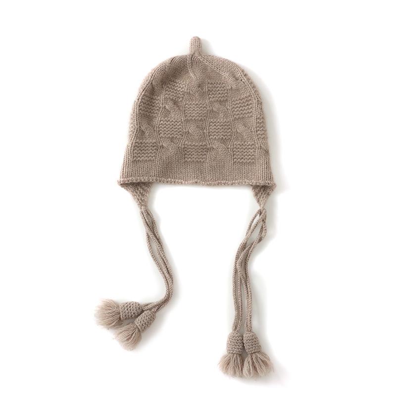 Autumn and winter new commuter women's knitted wool hat warm ear protector fringed pendant handmade twist all-match hat