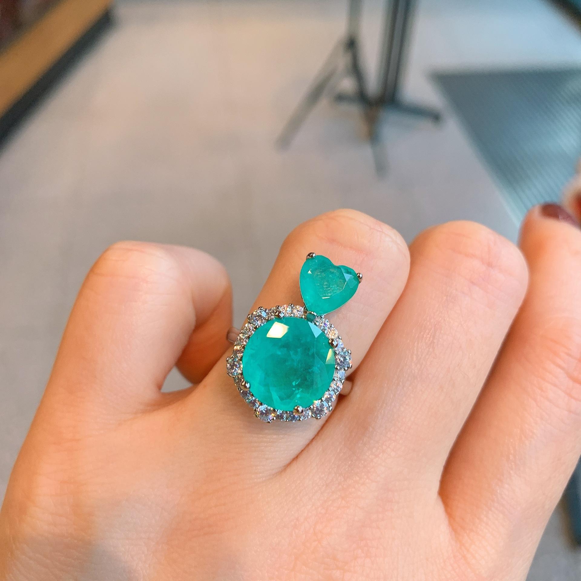 

Кольцо Параиба с имитацией европейского и американского темперамента для женщин с круглым изумрудным цирконом No. 6