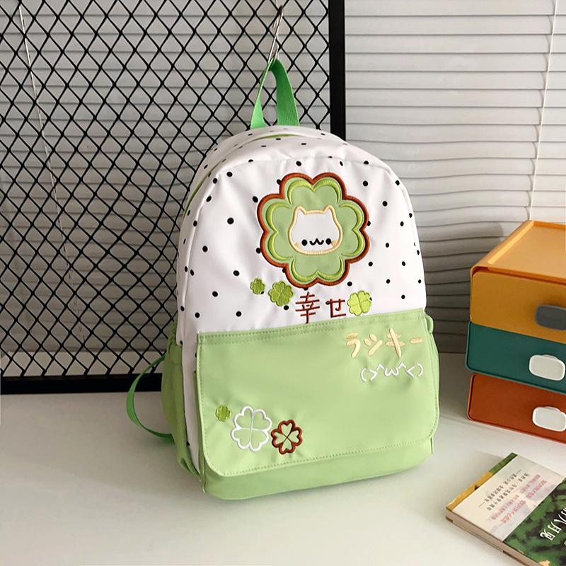 Schoolbag trendy high-value polka dot four-leaf clover cartoon backpack for junior and high school students cute kitten large-capacity schoolbag