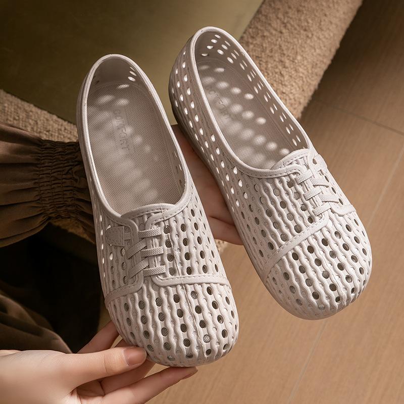 Suvised õõnes mustriga hingavad paksu tallaga sandaalid naistele ja pehme tallaga vabaaja rannaplätud naistele