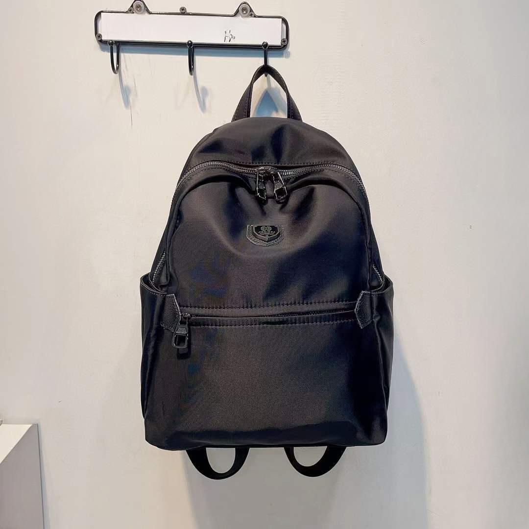 Новый женский водонепроницаемый рюкзак из ткани Оксфорд простая и повседневная однотонная сумка для поездок на работу универсальная и модная женская сумка чёрный 3363₽