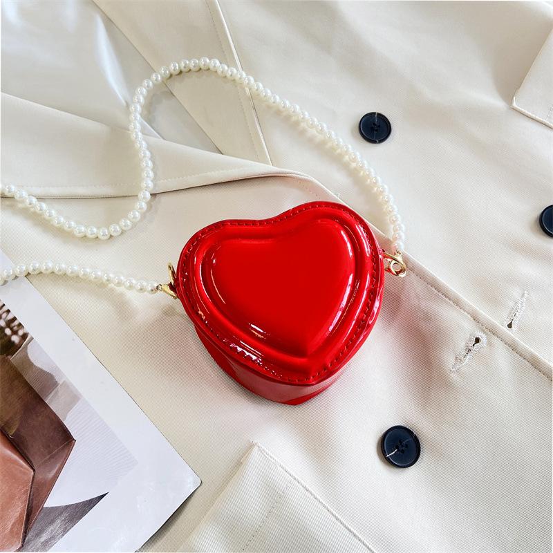 

Internet celebrity mini fashion small bag women s 2025 spring new versatile ins pearl chain single shoulder messenger mouth red envelope красный
