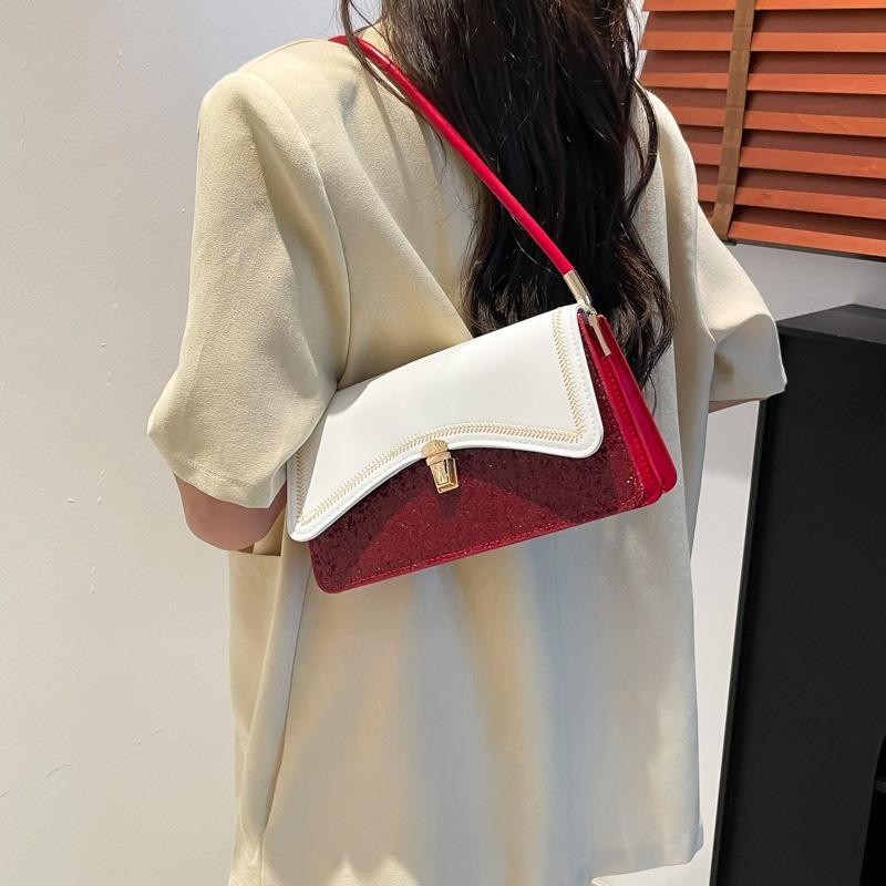 Damen neue Damentaschen sind leichter Luxus und vielseitig, kontrastierende Farben, hochwertiges Temperament und Aussehen, tragbare Schulter-Achseltasche.