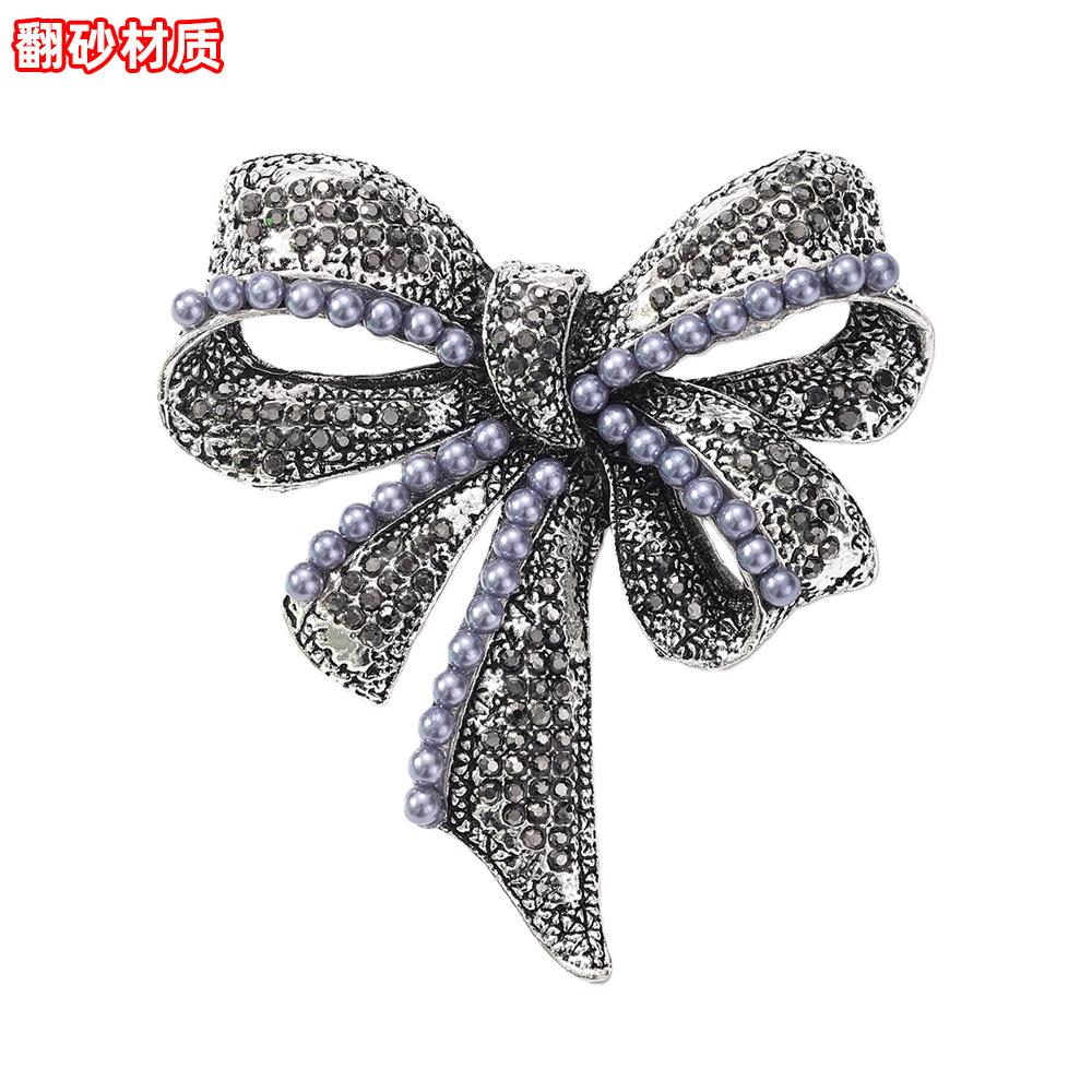 High-end bow brooch retro temperament high-end corsage fashion coat accessories fixed clothes pin