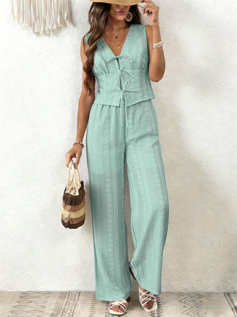 Sleeveless V-Neck Romper Shorts with Floral Print and Tie Detail in Light Blue