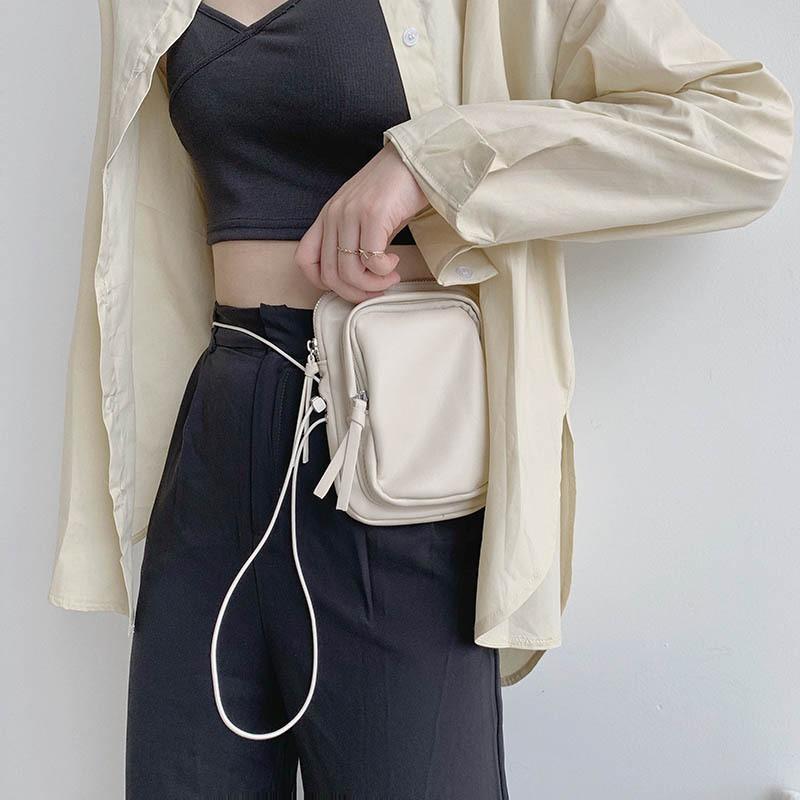 Mini mobile phone bag, soft leather versatile simple breast bag, women's high-end sense niche single shoulder messenger bag