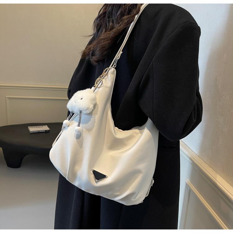 

Lightweight and versatile large-capacity nylon cloth bag 2025 new women s backpack commuter shoulder messenger bag