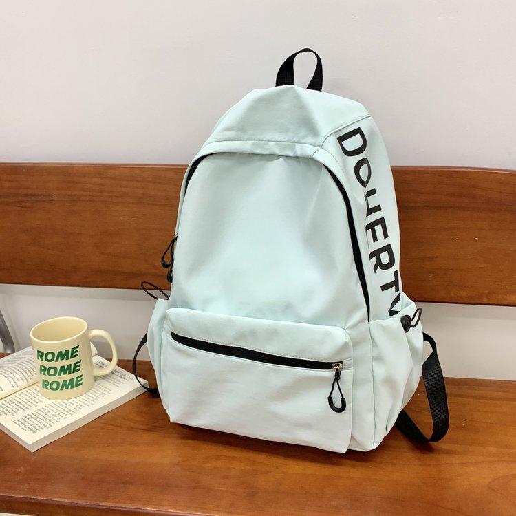 Schoolbag Korean version girl light solid color simple small schoolbag women large capacity junior high school high school students computer backpack