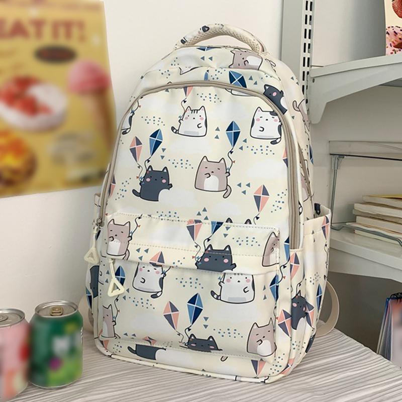 

Новый мультяшный рюкзак с принтом кота, большой вместимости, многослойный, легкий, с защитой спины, водонепроницаемый школьный рюкзак, повседневный рюкзак-джокер белый