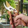 A Modern Carbon Steel Pruning Shear with Japanese SK5 Steel Blades, Featuring an Ergonomic Wooden Handle, Heavy-Duty Side-Cutting Scissors Designed