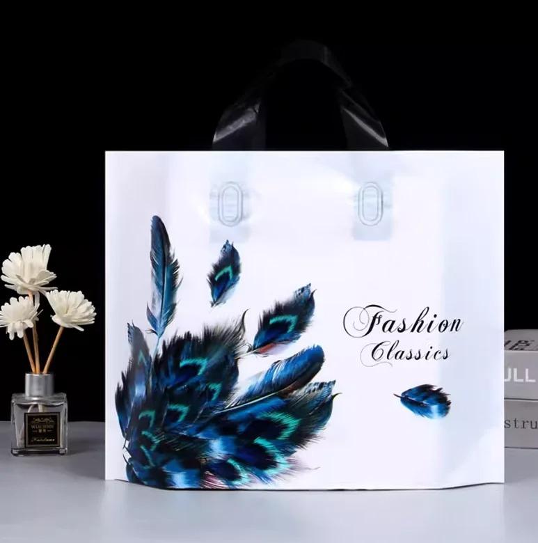 50pcs New models Handbag thick 0.14mm durable clothing cosmetic gift Shopping bags Resilient Powerful handheld Portable Packaging bag