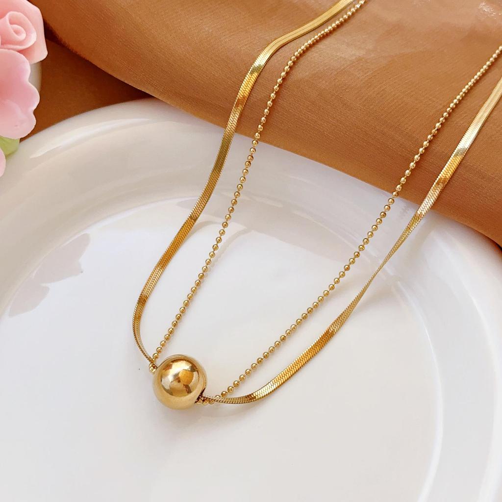 Złoty naszyjnik ze stali nierdzewnej: Elegancka, Wszechstronna, Nieblaknąca Biżuteria Damska