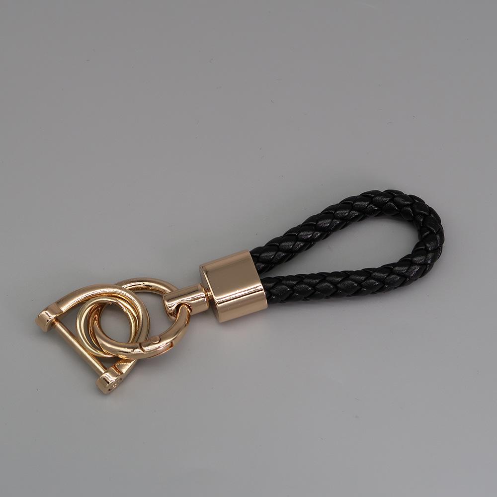 

Французский плетеный кожаный брелок для ключей с креативным вращающимся коротким брелоком из цинкового сплава