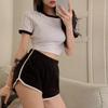 Korean Style Women's Summer Yoga Set: Three-Quarter Length Hot Pants and Trendy Outerwear for Running and Casual Workouts.