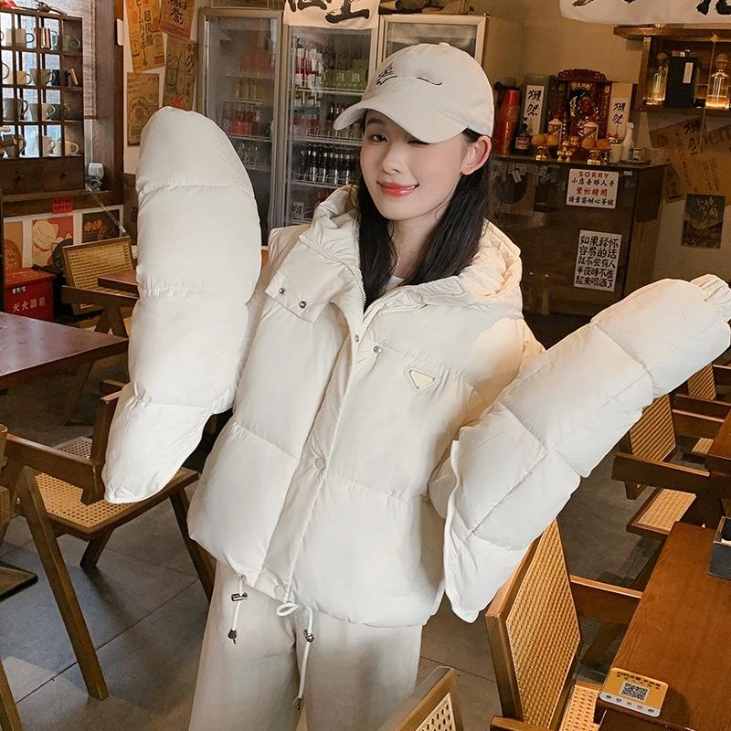 

Женская короткая ветрозащитная теплая зимняя куртка с капюшоном и съемными рукавами L слоновая кость