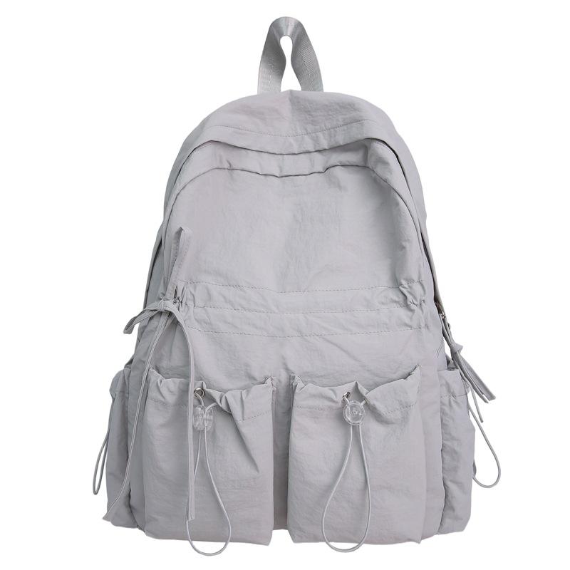 Large capacity schoolbag female junior high school student cute bow high school large backpack female student high value college backpack