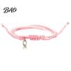 Soft Multi Strand Rope Bracelet Breast Cancer Awareness for Women, Adjustable Woven String with Heart Butterfly Alloy Pendants Ribbon Charm, Handmade