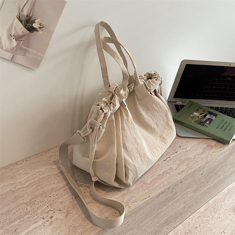Einfarbige Kordelzug-Handtasche Damen-Schultertasche Große Kapazität Pendler-Crossbody-Tasche