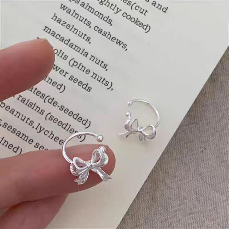 1 PERECHE Xiaoxiangfeng drăguț rafinat clip os ureche feminitate unică versatil lux ușor fundă clip ureche fără piercing