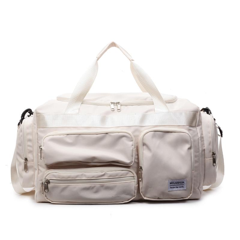 

Travel bag Large capacity women s light portable business travel luggage bag Oxford cloth dry and wet separation sports fitness bag off білий колір