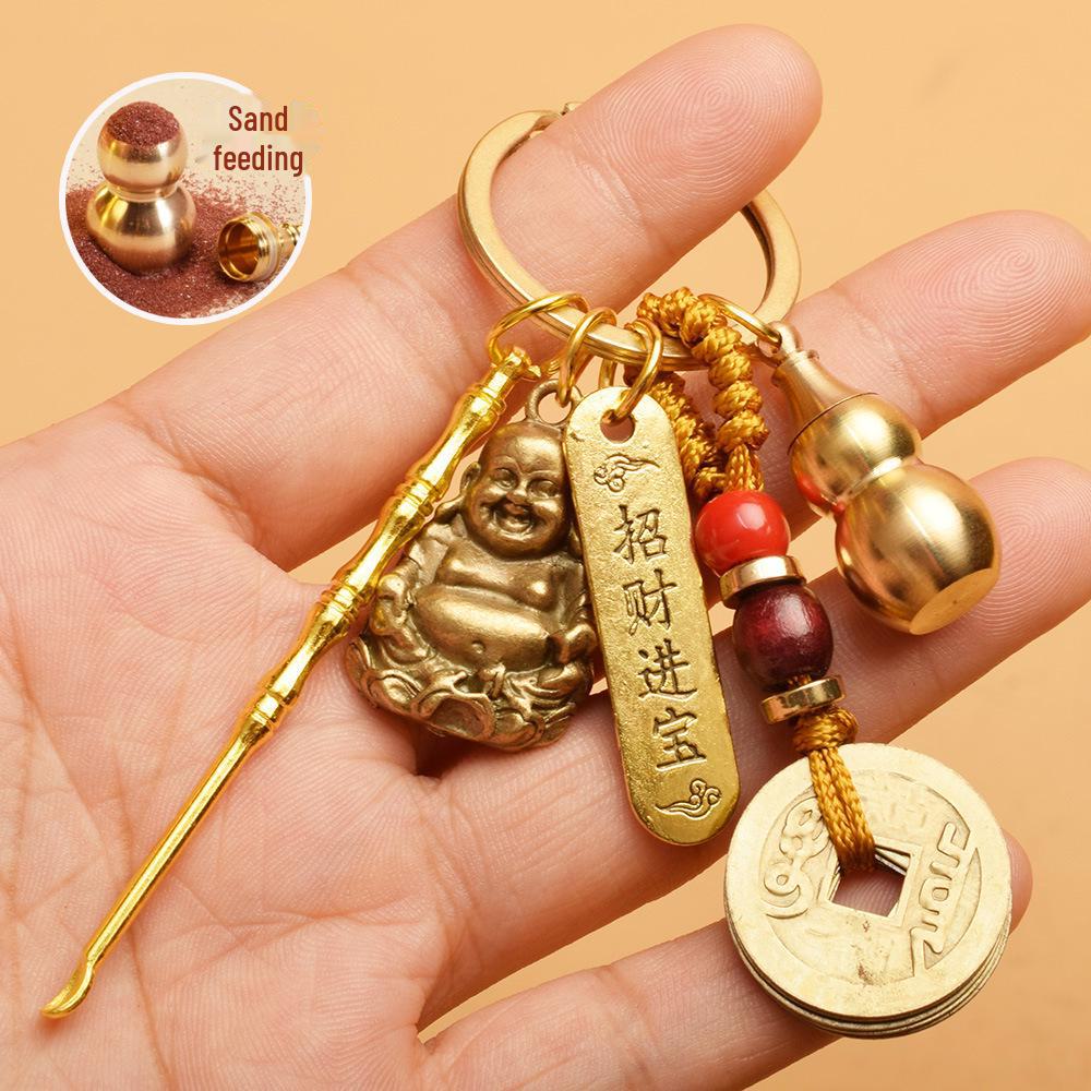 

Брелок-амулет: Монети п яти імператорів, гарбуз, абак, вежа Веньчан, мішок з грошима, Будда, совок, ложка для вух, кулон Мальовнича місцевість