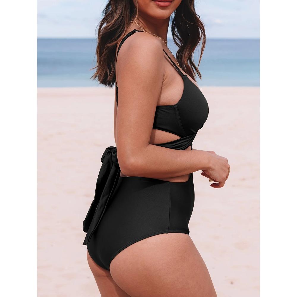 Costume da bagno intero da donna a tinta unita, slim-fit, caratterizzato da un incrocio profondo a V e un design cut-out, che mette pienamente in mostra eleganza e sensualità.