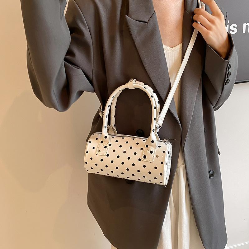 Super feurige Pünktchen tragbare Zylinder-Tasche Damen 2026 neue koreanische Nischen-Umhänge-Umhängetasche vielseitige Boston-Tasche
