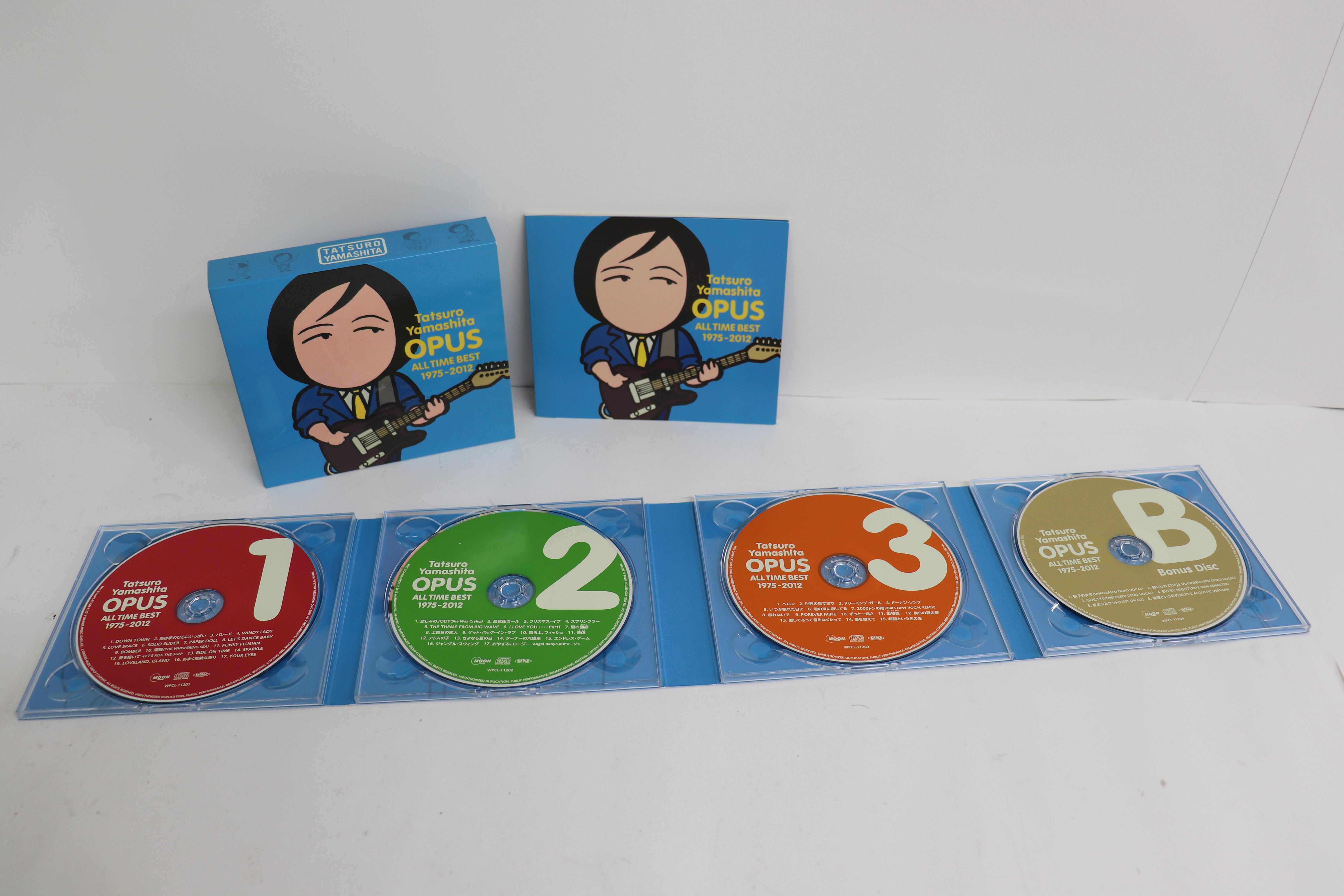 

CD TATSURO YAMASHITA Opus All Time Best 19752012 Limit WPCL112014 MOON 2012 Japan ObiJapanese PopRock Used