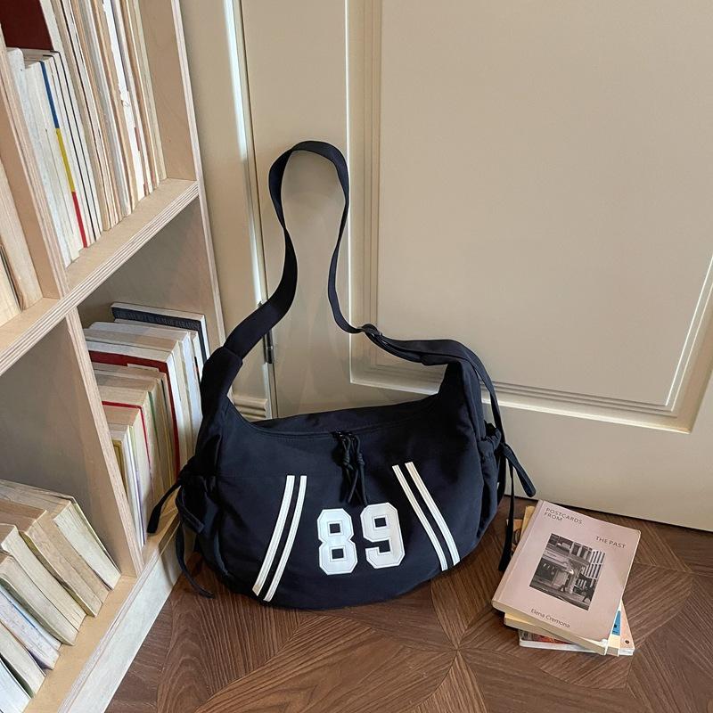 Fashionable and Unique Striped Bag for Holding Dumplings, A Casual Crossbody Bag with An Angle-hung Design At The Armpit.