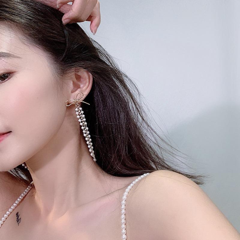 S silver needle Korean bow pearl long fringed stud earrings female face thin versatile earrings fresh lady style