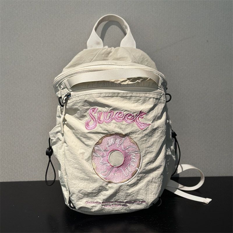 

Японский пончик вышивка шнурок школьная сумка уличный дорожный рюкзак походный рюкзак нейтральная вышивка нейлон карман-узелок Exquisite embroidered beige donut backpack