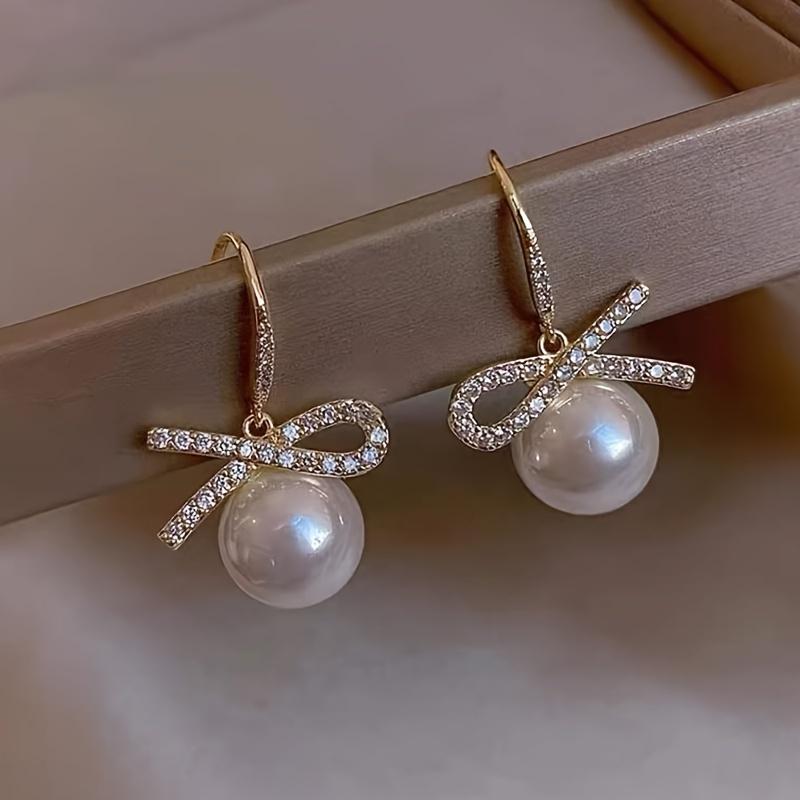 Valentine'S Day Red Faux Pearl Pendant Exquisite Bow Design Shiny Zirconia Inlaid Dangle Earrings Elegant Simple Style Delicate Female Earrings