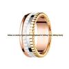 Bao Jia Shi Rotating Couple Rings: Rose Gold with Starry Design