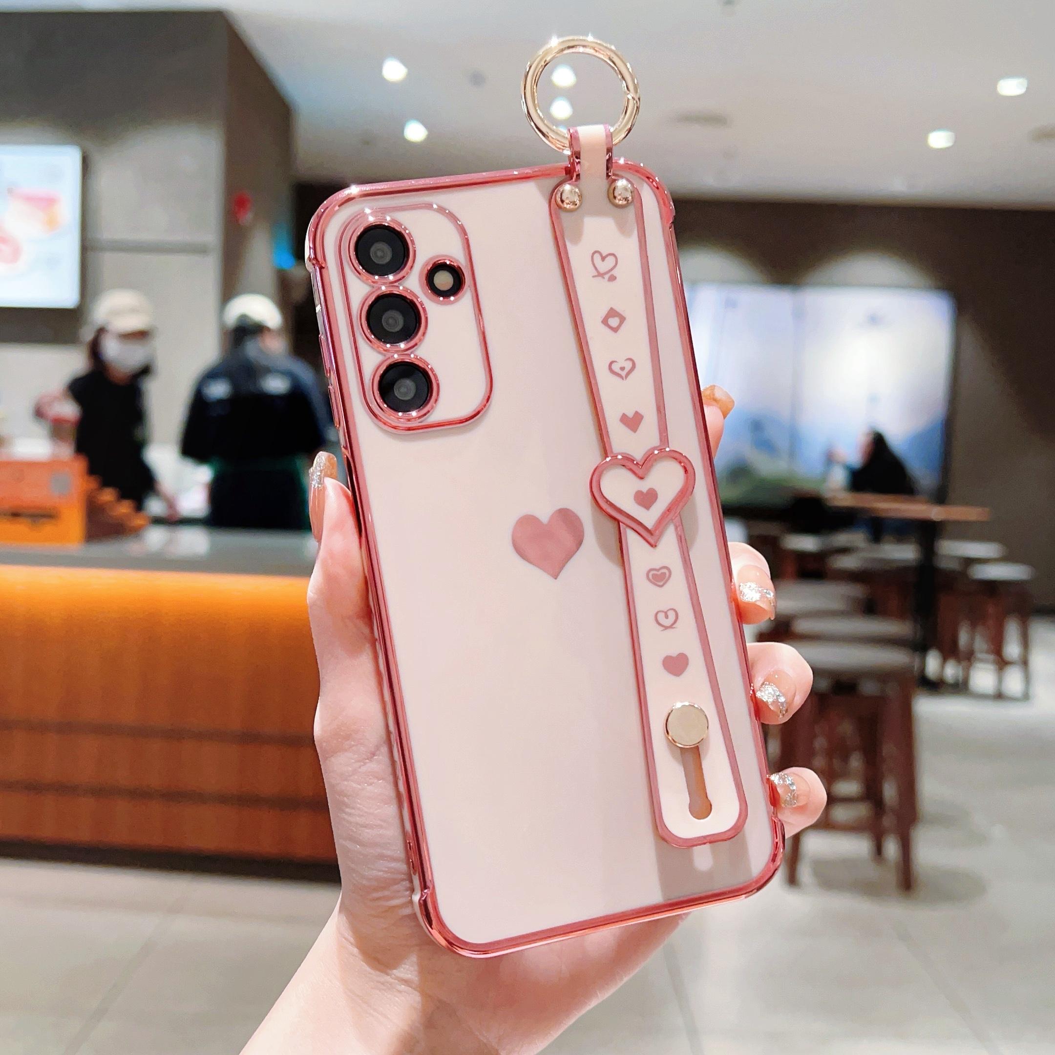 

For Samsung Galaxy A25 5G (Global) (161.0 X 76.5 X 8.3mm) Case with Wrist Strap TPU Phone Cover Love Heart Pink