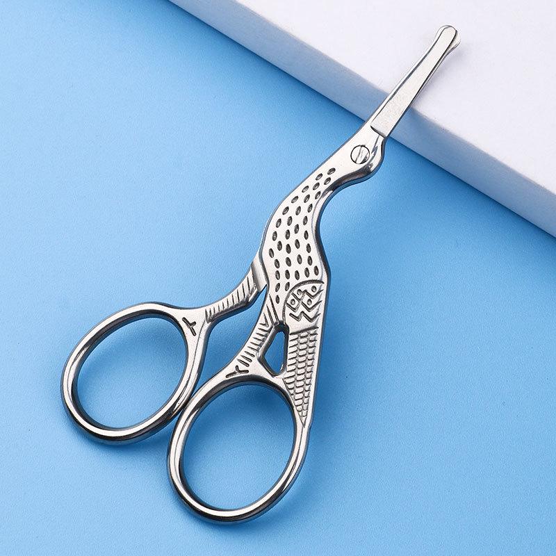 

Bird-shaped Stainless Steel Nose Hair Scissors for Safe Trimming and Eyebrow Grooming