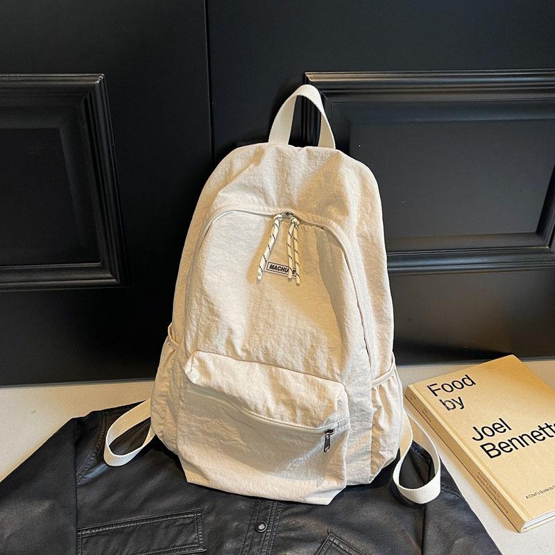 Simple and fashionable large-capacity backpack 2025 new leisure niche college class schoolbag women's solid color backpack