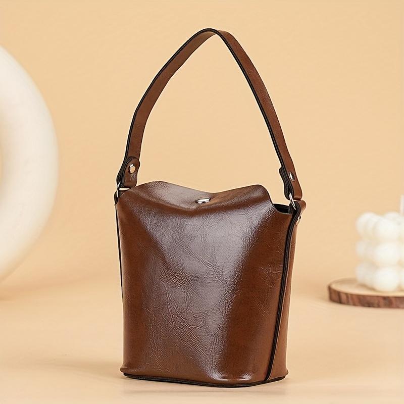 

Women s Elegant Mini Handbag - Spherical Coin Purse with Wrist Strap & Snap Closure, Golden- Compact Wallet-Style Bag