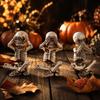 Halloween Skeleton Resin Figurines Set of 3 Sitting Skeletons with Pumpkin Heads Decorative Statues for Seasonal Tabletop Display or Shelf Decoration