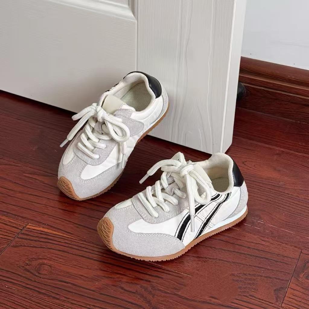 Children's moral training shoes 2025 spring new boys' sports shoes flat and light girls' board shoes Forrest Gump shoes