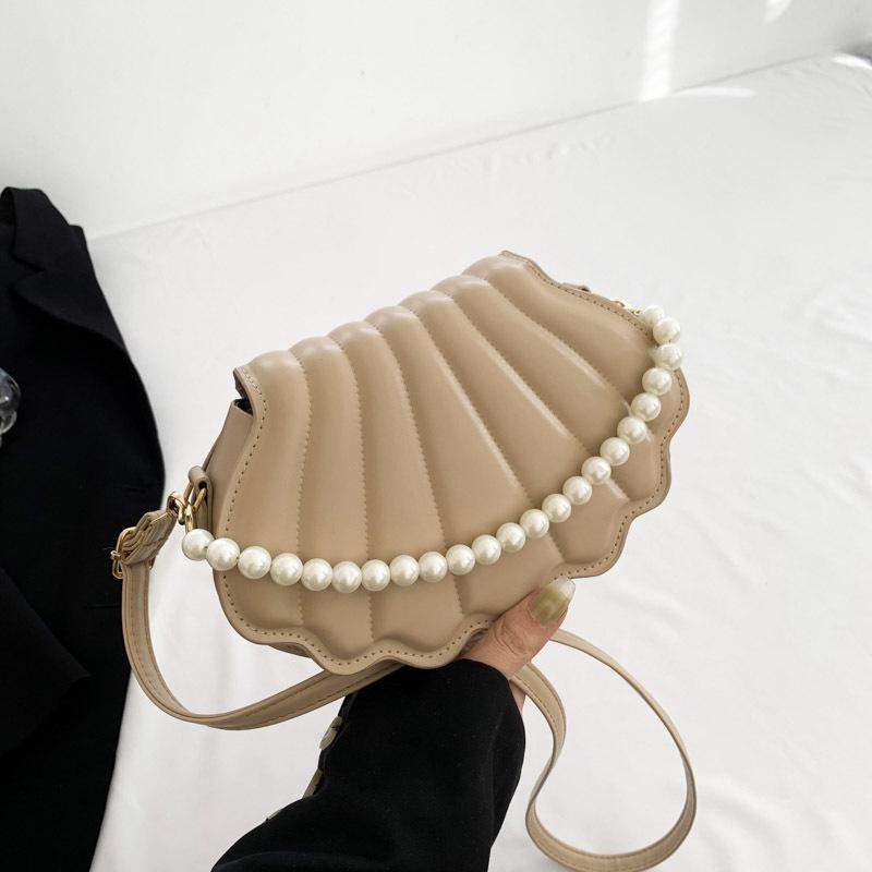 

Стильна і проста сумка-месенджер 2024 осінь нова сумка жіноча корейська версія зарубіжного стилю сумка через плече ніша тренд сумка раковина хакі