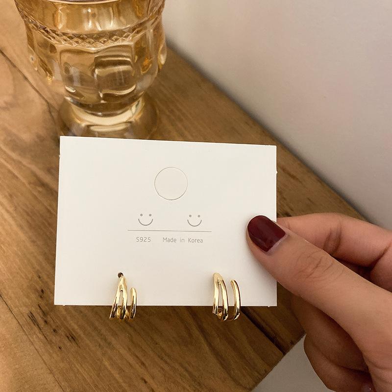 Metal wind round geometric earrings niche simple versatile stud earrings ins fashion high-end earrings