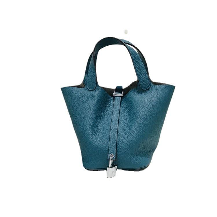 2023 Nowa damska torba ze skóry bydlęcej pierwszej jakości, wzór liczi, koszyk warzywny, worek typu bucket bag, modna i prosta, codzienna torebka