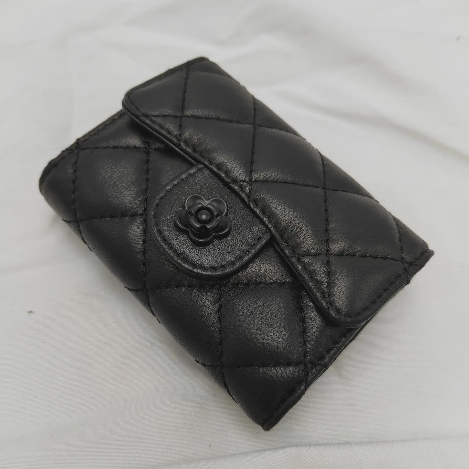 

Женский кошелек для монет и визитница из овчины с вышивкой 2025 года чёрный