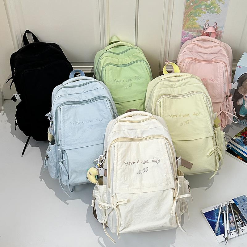 Korean backpack women's new simple and sweet large-capacity computer backpack lightweight junior high school backpack tide