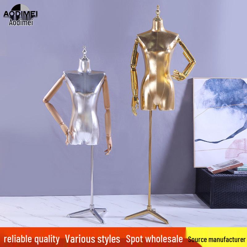 

Женский манекен полторса с подвижными руками и треногой-основанием для витрины Half-body mannequin with light arms